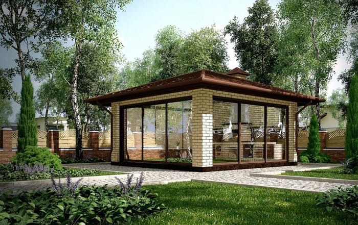 Кирпичная беседка на участке с крышей и колоннами