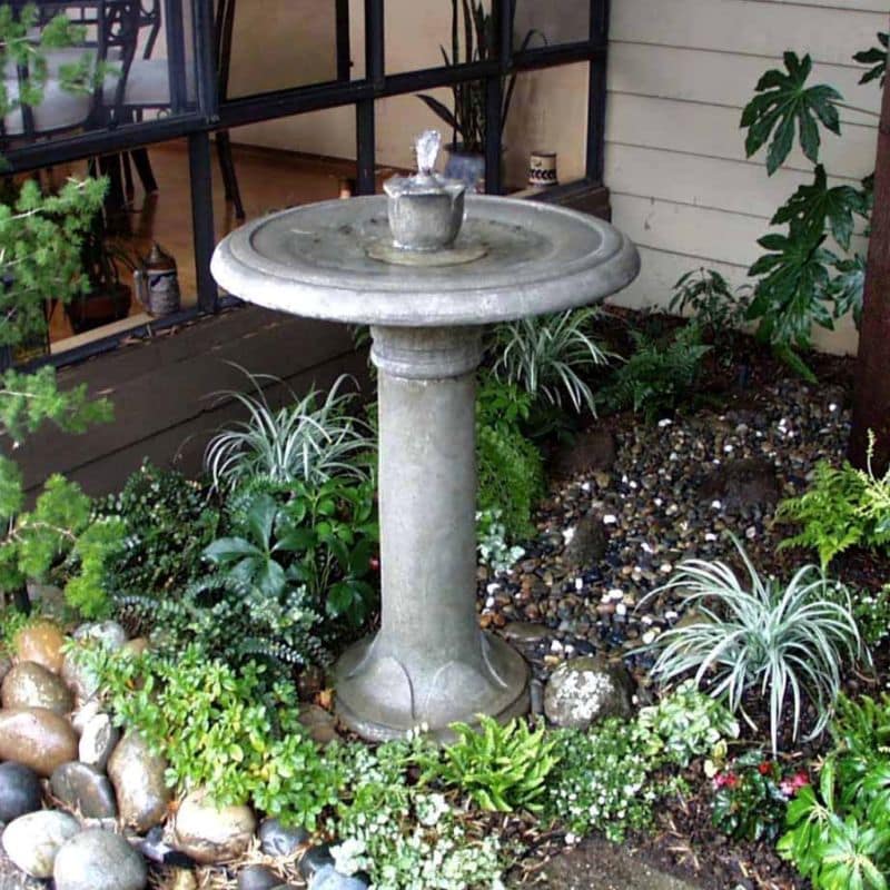 simple-landscaping-ideas-with-decorative-concrete-water-fountain-design-for-small-backyard